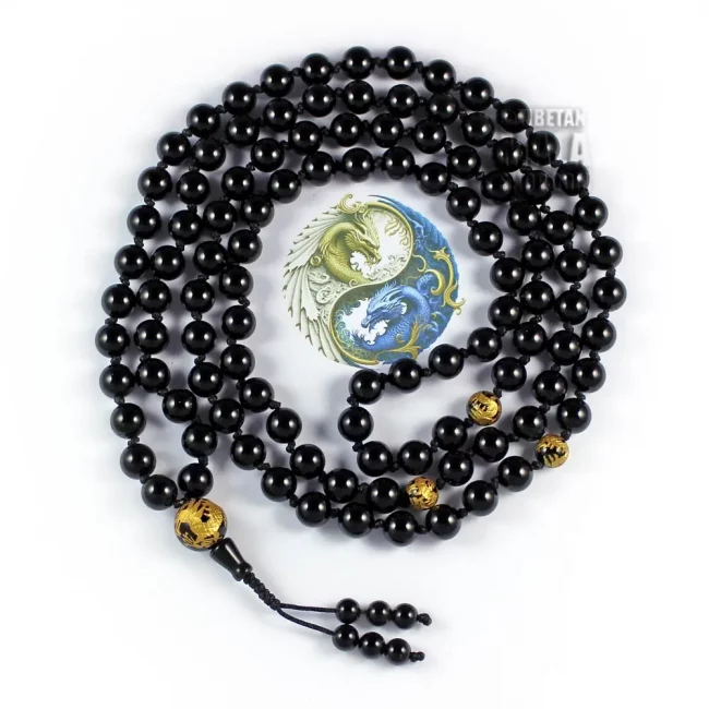 dragon mala with carved gold dragon beads