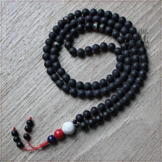three kayas mala beads with onyx, lapis and howlite beads