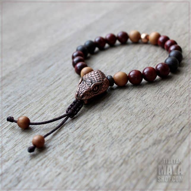wood snake bracelet with copper snake guru bead