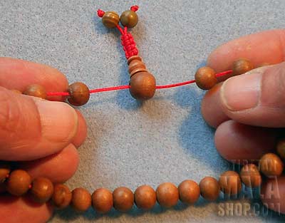 Step 3 - Adjusting Wrist Mala Beads with Tibetan Knot
